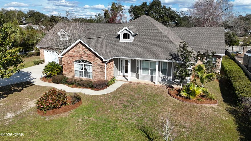 Spacious 3-bedroom, 2-bath traditional ranch-style brick home offering approximately 3,006 sq. ft. of living space in the heart of Callaway. This well-designed home features a split floor plan with generous living areas and thoughtful details throughout. An additional room just off the garage provides flexibility and could easily serve as a 4th bedroom, home office, or bonus space to fit your needs.

As you enter through the grand front entrance, you are welcomed by a formal dining room, perfect for hosting gatherings and special occasions. The kitchen is truly built for entertaining, offering ample counter space and a layout that flows seamlessly into the living areas. Just off the kitchen, you will find a breakfast area complete with built-in china and wine storage, giving you both convenience and charm. This home offers the best of both worlds with a full breakfast area as well as a separate formal dining space.

The primary suite is truly impressive, featuring a large master bedroom, a huge master bath, and a spacious walk-in closet located just off the bathroom. The split floor plan provides privacy for the additional bedrooms and guest areas.

Additional features include a good-sized laundry room and an oversized garage with two main bays plus a third rear-access bay perfect for a golf cart or additional storage.

This classic Southern ranch-style brick home welcomes you with a wrap-around front porch, perfect for relaxing and enjoying the neighborhood. Step out back to the back porch, a great spot for winding down and enjoying quiet Florida evenings.

The location is exceptional--just one street over from waterfront property and close to family-friendly parks, including Gore Park right around the corner. Located in the heart of Callaway and just minutes from Tyndall Air Force Base, the area has grown tremendously and now offers a variety of shops, restaurants, and everyday conveniences just around the corner.

This home offers space, charm, and an incredible location all in one.