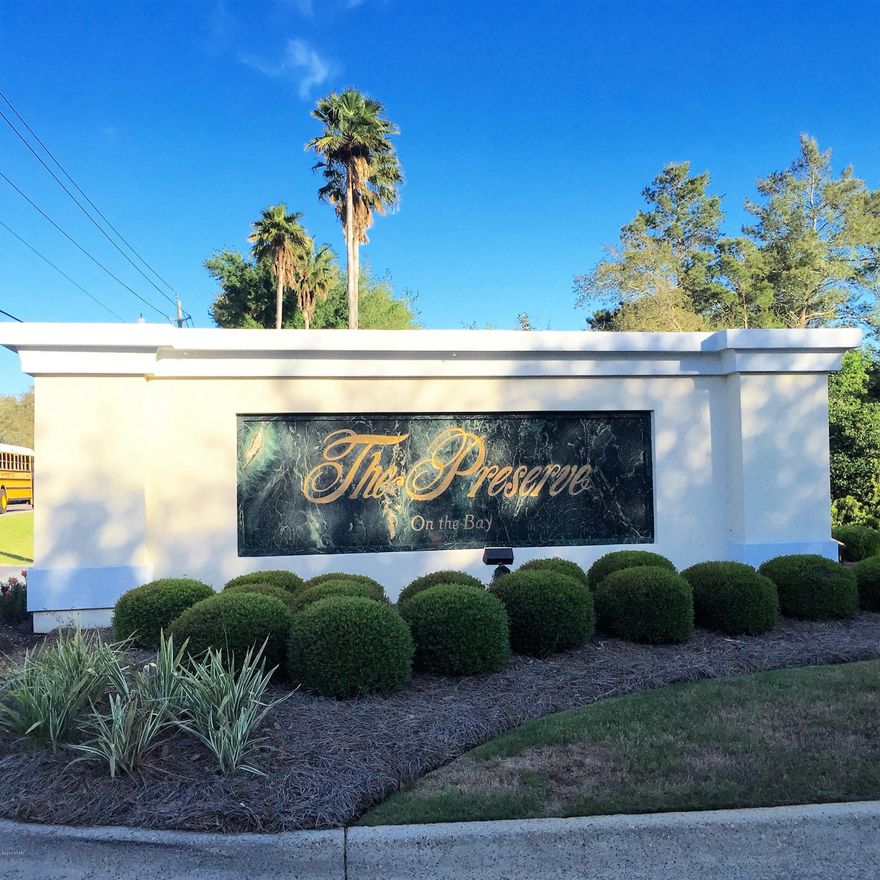 The Preserve on Panama City Beach is Bay County's most elite community and is a community intent on preserving the gorgeous natural landscape of this prominent bay front neighborhood. The gated entrance is staffed 24 hours a day for security.  This is a truly serene, beautiful place to live and This home site is one of the larger ones left in the neighborhood and just  across the road from the bay. Call today to arrange for a preview of The Preserve.