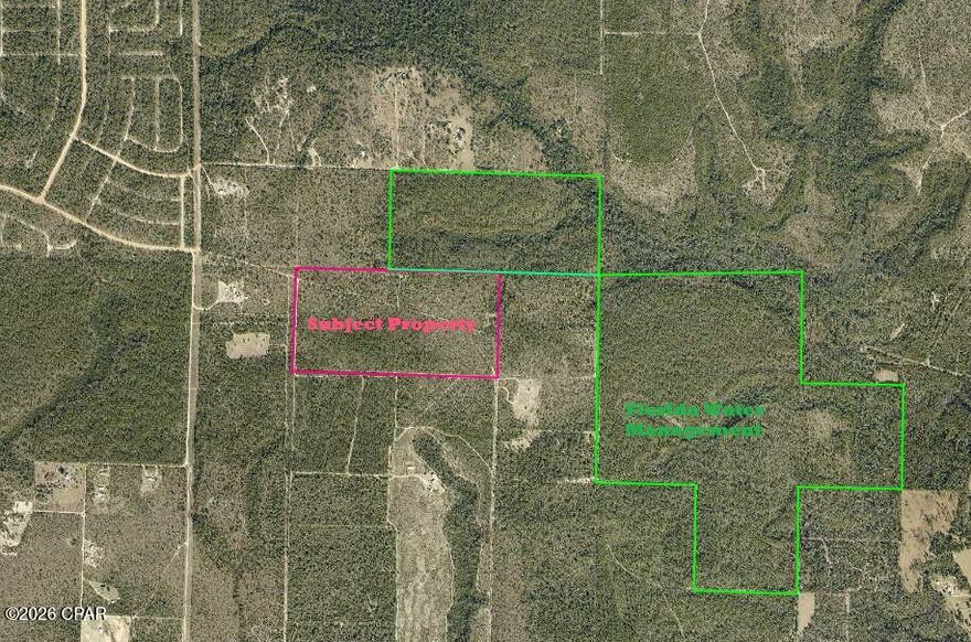 80± acres of private North Bay County timberland currently classified as timberland by the Bay County Property Appraiser. The property features mature timber, abundant wildlife habitat, established food plots, multiple deer stand, and several bear poles throughout the acreage. Improvements include a pole barn, additional storage building, and a manual well pump suitable for equipment or recreational use. A pond with a dock offers fishing and recreational opportunities. Road frontage on Elkcam Blvd provides access while maintaining a secluded, rural setting. Ideal for hunting, agricultural use, recreational retreat, or long-term investment. Property is being sold as Vacant Land. No assigned street address; see survey and parcel map for exact boundaries. 

Parcel ID: 03007-000-000; 03013-000-000; 03016-000-000 is all officially in Southport, Bay County, and is located near the Chipley area.

Additional information and property/game camera photos available upon request. Buyer to verify zoning, utilities, access, and intended use.

More photos to be added shortly...