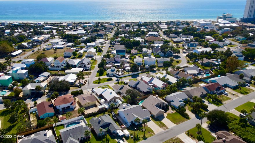 Substantial price reduction! Build your custom dream home on this premium, wooded, lot only 3 blocks from your private, gated beach access! Bid-A-Wee Beach, now a Florida Heritage site, is located in Panama City Beach, Florida adjacent to the new Margaritaville Beach Cottage Resort community. Enjoy the beautiful emerald coast beach life with no mandatory HOA fees. This lot is located on the only cross street in Bid-a-Wee that doesn't go directly through the neighborhood, so traffic is very limited. Adjacent corner lot is now under contract.