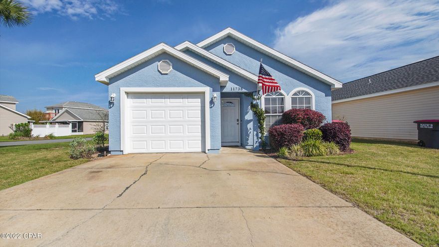 This home is in immaculate condition and sits on a nice corner lot. The home offers a new roof, new AC, new doors (front and back), new siding, and is freshly painted as of 2021. Luxury vinyl plank flooring was installed in 2017. The living room and kitchen have an open floor plan, which is great for entertaining. The master bedroom is spacious and has an ensuite. The garage can fit one car or can be used for extra storage. The home is located minutes from the beautiful beaches and central to many shops and restaurants. This would make an excellent short term rental or primary residence.