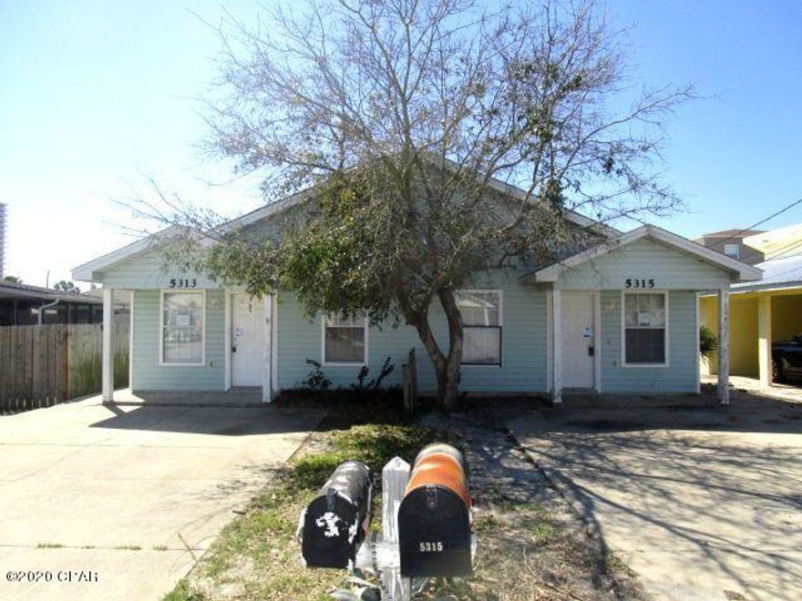 GREAT OPPORTUNITY to live in one side and rent out the second unit!  Both units feature a Great room with vaulted ceilings.  The kitchen has a breakfast bar and a small eat-in dining area.  Unit 5313 has a glass-sliding door to the back yard with a patio and yard building.  Unit 5315 has a door to access the patio and yard, and it too has a yard building.  The duplex needs a new roof, but it has loads of possibilities for a great rental property, as well!  Property being sold in its AS IS condition.