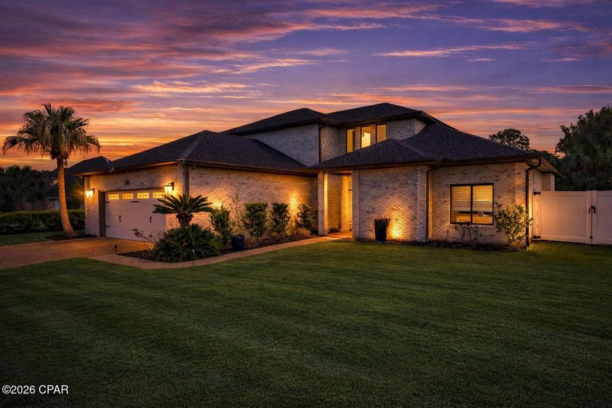 Located within the gated golf and marina community of Bay Point, this fully remodeled 4-bedroom, 3-bath residence offers 2,913 square feet designed for elevated coastal living and exceptional entertaining. Renovated top-to-bottom in 2019--including roof, electrical, lighting, appliances, two water heaters, and dual HVAC systems--the home blends modern infrastructure with curated coastal style. Brand-new custom closet systems throughout, upgraded kitchen cabinetry with convenient pull-out storage, added recessed lighting with strategically placed dimmers, new garage door opener and thoughtful design details reflect meticulous care. The kitchen also features a brand-new ice maker that conveys, along with a premium faucet offering a built-in seltzer dispenser, available with an acceptable offer. The flexible layout includes a private first-floor primary suite and an expansive upstairs retreat with a spa-inspired bath and private balcony, creating a true owner's sanctuary. A mezzanine bonus level offers ideal space for an office, lounge, or flex area. Designed to host, the former dining room has been transformed into a striking Bourbon Lounge and Sports Theater, complete with custom shelving, LED accent lighting, kegerator, beverage refrigeration, and double doors opening to a newly completed 1,140 sq ft bi-level paver patio. The patio is thoughtfully prepped for a future outdoor kitchen with reinforced stone underlayment and utility conduits beneath the pavers--built for game days, gatherings, and coastal evenings alike. Additional highlights include brand-new vinyl fencing with multiple gated access points (including an oversized entry), custom garage storage, irrigation, and motion lighting. Select features--including bourbon lounge equipment, gym equipment, beverage appliances, Ring cameras (3) and additional refrigerators--may convey with an acceptable offer. Bay Point offers gated security, championship golf, marina access, and one of Panama City Beach's most established residential environments. Opportunities with this level of renovation and entertaining infrastructure in Bay Point are increasingly rare.