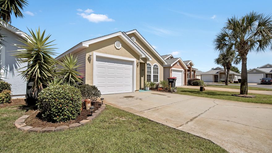 This home is a must see! Very well maintained 2 bedroom, 2 bath home with 1 car garage in Palm Cove subdivision. New laminate flooring throughout the dining and living room. Great location! Close to the Beach, restaurants and shopping. Palm Cove offers two pools and the grounds are maintained by the Association.