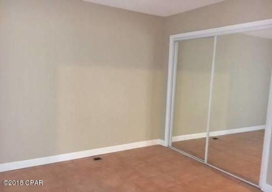 Rare find. NICE WATERFRONT 2 bedroom townhome close to Tyndall AFB. Speaking of decks, it has a huge party deck. Stand on it and look over Martin Bayou that goes all the way out to St Andrews Bay. Put your Kayak or canoe in for a great workout. It has a 16 x 32 basement for great storage. Upstairs deck has a huge storage unit that could be turned into an amazing master bedroom closet. at night sit in your chair on the deck and watch the sunset. So much you can do here. Would make a great Investment property also.  NO HOA - New Roof