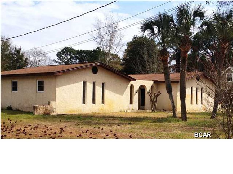 Nice home in Northshore-- great spaces inside and out for your family to enjoy at an affordable price. This mediterranean styled stucco home has a courtyard entrance that you can fill with potted plants, fountains, and outdoor furniture for a Tuscan flair. Inside, the kitchen is open to the family room and dining area, so that everyone can enjoy the woodburning fireplace and built-in acquarium. A screened-in porch overlooks the inground swimming pool and large back yard, which boasts fruit trees and a covered koi pond. Also, the ultimate man-cave is included with this home: a large workshop, yard building, carport, AND RV/Boat garage-- as well as the two-car garage that is attached to the house. Seller states that the AC unit has been recently serviced, the pool pump and water heater