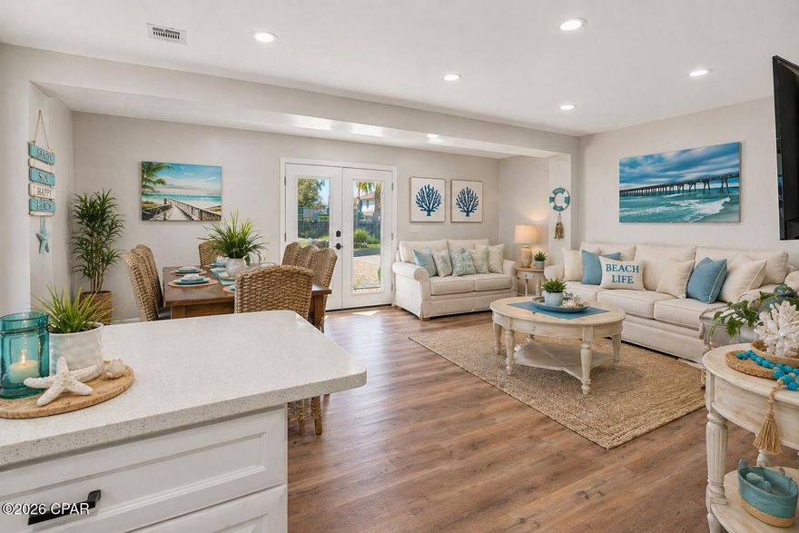 **MOTIVATED SELLERS ENCOURAGE ALL OFFERS** Welcome to your fully renovated beach retreat! This 5 bed 3 bath home offers over 2,400 square feet of thoughtfully designed living space. With no HOA, this property provides the freedom and flexibility both homeowners and investors are looking for. Designed with outdoor living in mind, the private backyard oasis features an oversized deck, hot tub, fire pit, and even a volleyball court that is perfect for entertaining guests or maximizing rental appeal. There's also an outdoor shed ideal for storing beach gear, bikes, and more. For those looking to customize, there is plenty of space to add a pool, with the option to convert the volleyball court area into your own private pool retreat... Inside, the home has been completely renovated from top to bottom, offering a fresh, modern feel throughout. Major updates include a new roof, new A/C system, and all new landscaping. Located just 5 blocks from the beach, this home is a quick golf cart ride away from the sugar white sand and has the ability to comfortably sleep 14-16 guests. With rental projections exceeding $80,000 annually, this property is perfectly positioned as a high performing investment, second home, or even full time residence. **Certain listing photos have been virtually staged with AI generated furnishings and design elements to help buyers visualize the property's potential.**
