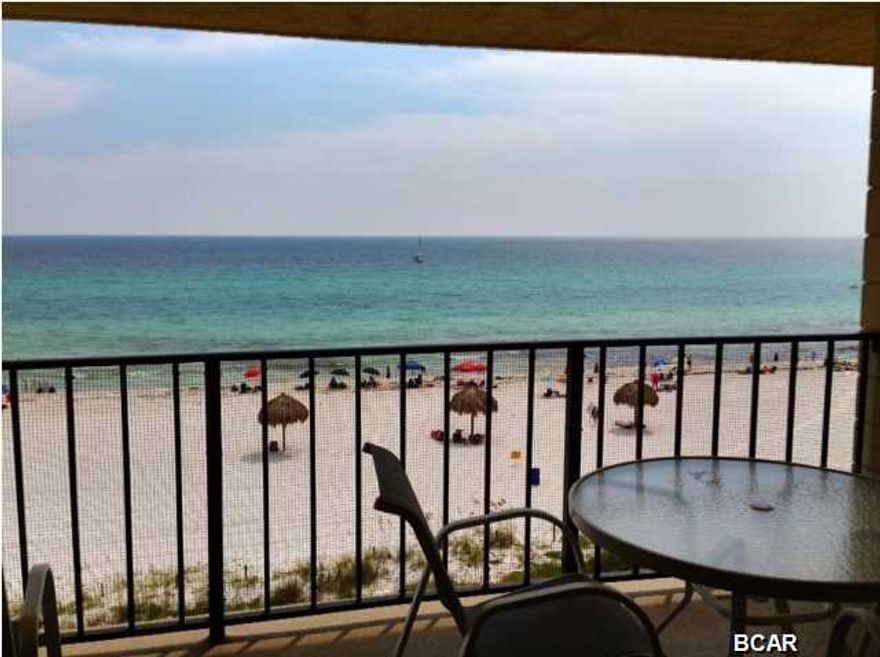 Come see this beautiful condo located on the desireable 5th floor at the Mariner West! Its truly gorgeous and being sold furnished .. ready for you to enjoy. This 1 bedroom, 2 bath gulf front condo features tile throughout, with exception to the master bedroom which is carpeted, lovely wainscoting down the hallway and in the both full baths, furniture that was recently purchased, updated kitchen cabinetry, countertops, appliances, and a covered balcony, which is wonderful when it rains or when you prefer to be in the shade. From the balcony you can see the sunrise and the sunset most of the year. This condo has a full kitchen, breakfast bar, dining area, large living room with amazing gulf views and a separate laundry room with a FULL SIZE washer & dryer right outside unit. Mariner