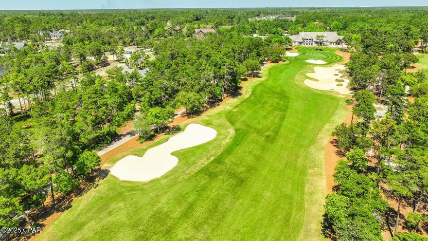 Build your dream home on this premium 0.48-acre 'A' lot, perfectly positioned along the 18th fairway of the renowned Shark's Tooth Golf Course, within the exclusive gated community of Wild Heron. This exceptional homesite offers more than just peaceful golf course views; it presents a rare opportunity to design a custom residence with an approved variance that allows for an expanded building footprint. This added flexibility not only maximizes your living space but also enhances the potential for breathtaking, unobstructed views of the fairway. Imagine calling the pro shop to have your clubs loaded on a cart, strolling just a few hundred feet to the clubhouse, then finishing your round by dropping your clubs off at home after the 18th hole and capping the day with a visit to the ''19th hole''. If golf had a ''ski-in, ski-out'' equivalent, this would be it! Nestled on the shores of Lake Powell near Inlet Beach and Panama City Beach, this serene homesite also offers no build-out time and convenient access to the Shark's Tooth clubhouse via a short walk or golf cart ride. Perfect for a primary residence, second home, or investment property, this lot conveys with a boundary, topographical, and tree survey. Wild Heron is a non-rental coastal sanctuary offering exceptional amenities, including a heated pool and hot tub, fitness center, playground, fire pit, and 24 miles of pet-friendly walking and biking trails. Residents also enjoy access to Lake Powell and the white-sand beaches of the Gulf of Mexico. The boathouse is fully stocked with kayaks and paddleboards for easy access to the lake and Camp Helen State Park. Exciting community developments include a new marina with boat slips and a future golf course connecting to WaterSound Origins, further enhancing property value. Wild Heron also hosts regular events such as live music, food trucks, movie nights, and farmers markets. Optional memberships are available for the Shark's Tooth Golf Course, WaterSound Beach Club, and tennis center. 
Residents also enjoy access to Lake Powell and the white-sand beaches of the Gulf of Mexico. The boathouse is fully stocked with kayaks and paddleboards for easy access to the lake and Camp Helen State Park. Exciting community developments include a new marina with boat slips and a future golf course connecting to WaterSound Origins, further enhancing property value. Wild Heron hosts regular events such as live music, food trucks, movie nights, and farmers markets. Optional memberships are available for the Shark's Tooth Golf Course, WaterSound Beach Club, and tennis center. Ideally located just minutes from 30A, Rosemary Beach, Alys Beach, and Pier Park, this property offers privacy, natural beauty, and convenience.