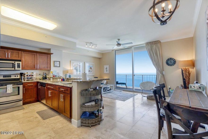 NEVER BEEN A RENTAL!! Memories are special moments that tell your story...begin your story here in Tidewater Beach Resort Unit 2706! This PENTHOUSE LEVEL 1 bedroom 2 bath with bunks 849 sq ft ''F'' plan unit boasts newer stainless steel kitchen appliances, travertine tile flooring and LVP flooring(master), upgraded kitchen cabinets and granite countertops,  wall Décor updated in 2019, newer HWH, too many upgrades to list. Tidewater Beach Resort is a premier property in Panama City Beach featuring two outdoor lagoon style pools, heated indoor pool, movie theater and so much more! Located within one mile of Pier Park.