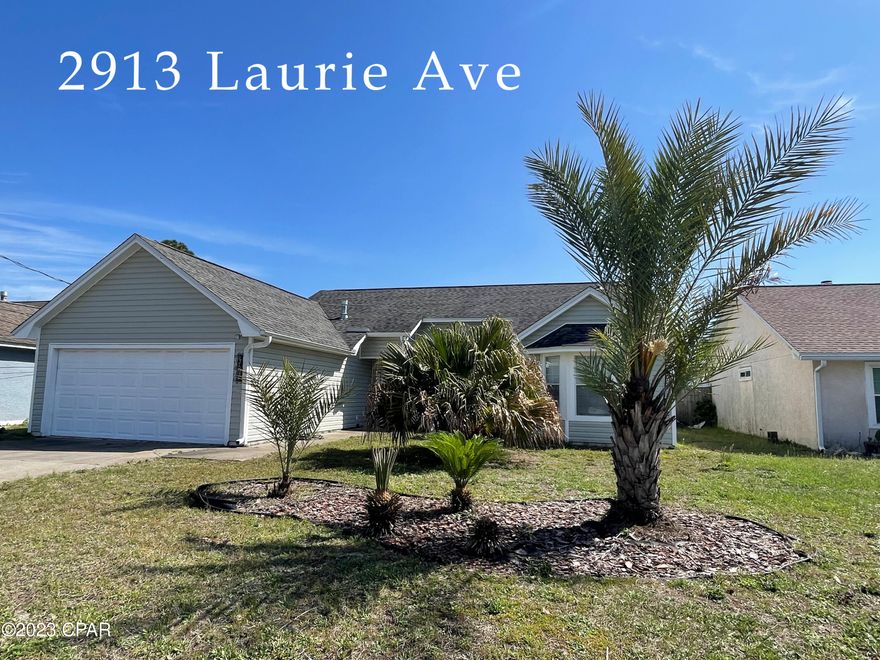 Looking for a comfy place to call home? This place is located minutes from the gorgeous beach and sits on a large, fenced lot. Features the popular split floor plan with a good-sized master bedroom and en suite bathroom. High ceilings and big bay windows in two of the bedrooms add a design touch. 2015 updates include the expensive items like AC, roof, appliances, windows. Living room and bedroom skylights bring in the sunny Florida light. You will find easy care laminate plank and tile flooring throughout. Everyone wants a 2-car garage. Centrally located and convenient to some of the best dining, shopping and entertainment in the area. Just off North Lagoon near St. Andrews State Park, marinas and the best fishing in the country!  Seller moving out of state and furnishings are negotiable. Small wood deck in back needs to be removed/replaced. Reach out today for a private tour!