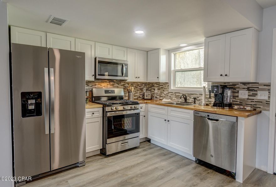 CURRENTLY UNDER CONTRACT, SELLER WILL CONSIDER BACKUP OFFERS. WOW! Introducing a fully remodeled & fully furnished vacation home within 5 min walk to the beach. Located in a desirable neighborhood, this stunning townhome has undergone a complete transformation, combining modern upgrades with impeccable design. Upon entry, you'll be greeted by an open-concept living space, fully remodeled kitchen with new counter tops, cabinets, back splash, all new SS appliances, new doors and window, LVP flooring throughout, light fixtures, furniture & accessories etc. Upstairs you will find 2 spacious bedrooms, 2 new tiled walk-in showers and a balcony overlooking one of the 11 community pools. Outside, you'll find a charming patio area, perfect for enjoying the sunshine and alfresco dining. STR allowed with projected ROI of $50k+!
Don't miss out on the opportunity to make this your new home or rental beast. Two assigned parking spaces in front of the unit. LOW HOA includes: 11 pools(5 heated) shuffleboards, beach house/café, mini golf, exercise room, WIFI, cable, pest control, termite bond, trash, ground keeping, property patrol, gated community etc. All info is believed to be correct but all parties must do their due diligence.