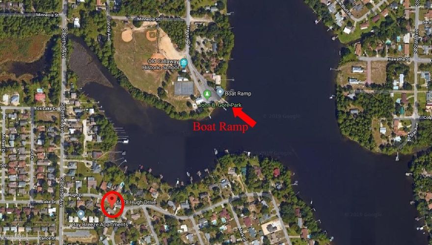 MOTIVATED SELLER! Huge corner lot ideal for a two story home so you can enjoy a possible view of the water!  There was a home on the property, but the storm caused irreparable damage so you will be working with a clean slate.  All utilities...electric, public water, and public sewer remain, you just need to bring your house plans and start building!  This lot is across the street from a deep water bayou that leads to the bay and there is a public boat ramp just around the corner.  Great family-friendly neighborhood and you're convenient to shopping, schools and so much more!  All info is approx. and must be verified by Buyers if important.