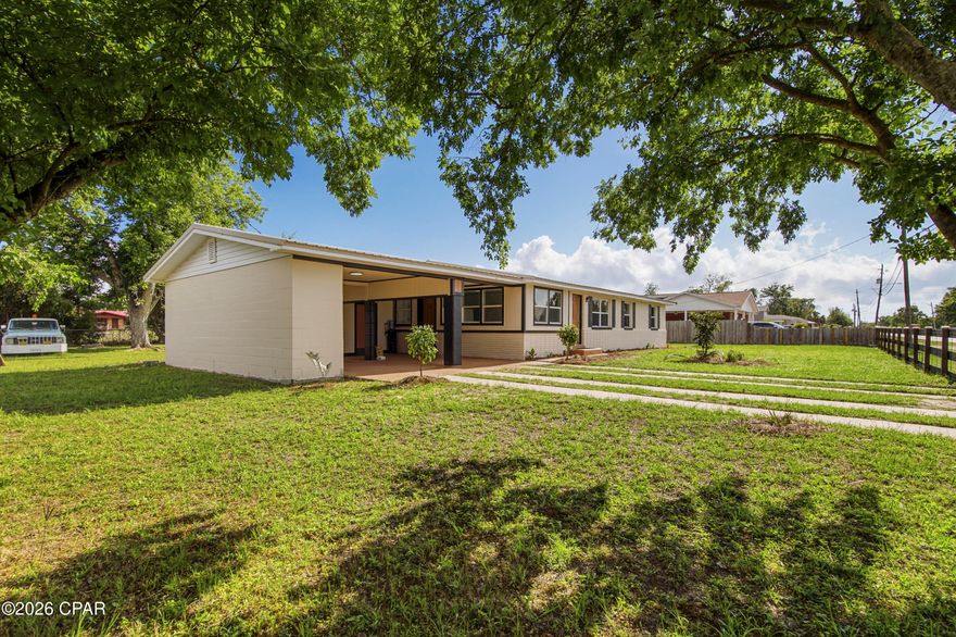 Opportunities like this are exceptionally rare -- a beautifully remodeled property with MIXED USE zoning that allows you to legally LIVE and WORK in the same space. Whether you're an entrepreneur, small business owner, creative professional, investor, or simply someone who wants flexibility for the future, this property delivers a lifestyle and business opportunity that's hard to duplicate.
Perfectly positioned near Tyndall Air Force Base and just off busy Tyndall Parkway, the location offers both convenience and visibility with strong traffic counts for potential business exposure. Unlike standard commercial zoning, the Mixed-Use designation in this area allows residential occupancy -- giving you the freedom to operate a business without sacrificing the comfort of home.
Inside, the remodel is nothing short of brilliant. Every inch of the space has been thoughtfully reimagined for maximum functionality, flow, and style. The main area of this home features a living room, dining area, remodeled kitchen with quartz countertops and new stainless appliance package and 2 bedrooms and 2 full baths, including a stunning newly created primary suite complete with an ensuite bath and walk-in closet.
On the opposite side of the home, on the other side of the living room, there is a separate flex space with an oversized closet and an exterior door that walks out into the carport, which creates endless possibilities. Use it as a private third bedroom, client office, salon studio, creative workspace, consultation room, boutique, or home-based business -- all without clients or customers ever needing to enter your main living space. It's the ideal setup for maintaining both professionalism and privacy.
Outside, the oversized corner lot adds even more value and versatility. The fully fenced yard with front and side gates provides security and functionality, while the drive-through carport and generous parking areas make access easy for personal vehicles, trailers, work trucks, or business clients. There's plenty of room here to truly make the property work for your lifestyle.
Additional features include: huge corner lot with excellent accessibility; fully fenced with solar light post caps and multiple gated access points; large slab for the addition of a future shed; drive-through carport; working irrigation pump; flexible floor plan with residential and business potential; excellent visibility and convenience near shopping, dining, and Tyndall AFB; rare zoning flexibility in a rapidly growing area!
This is more than just a remodeled home -- it's a smart lifestyle investment that gives you options, flexibility, visibility, and freedom all in one property.