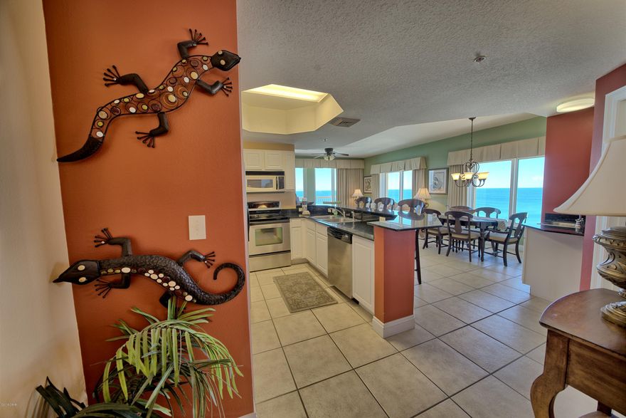 Tropical Panoramic Views! This beautiful 3BR/3BA West end unit is one of this resorts best! Exquisitely decorated utilizing a Tommy Bahama Caribbean motif set to impress even the hardest to please visitors!! Calypso features granite counters, tile floors, stainless appliances, and more! Calypso Resort & Towers is located adjacent to the new Pier Park Shopping & Event Center, and the new Dan Russell fishing pier! Calypso is now the premier location for anyone visiting Panama City Beach, and its value reflects just that! Beautiful tropical pools, Tiki Hut snack & beverage bar, fitness room, owners lounge, and 24hr security. If you are looking for the best condominium investment in PCB, then this unit is a must see for you! Park your car and walk to everything!! LOCATION LOCATION LOCATION Unit comes with a private parking spot to be sold separately for $35,000.00 All measurements are approximate, Buyer to verify.