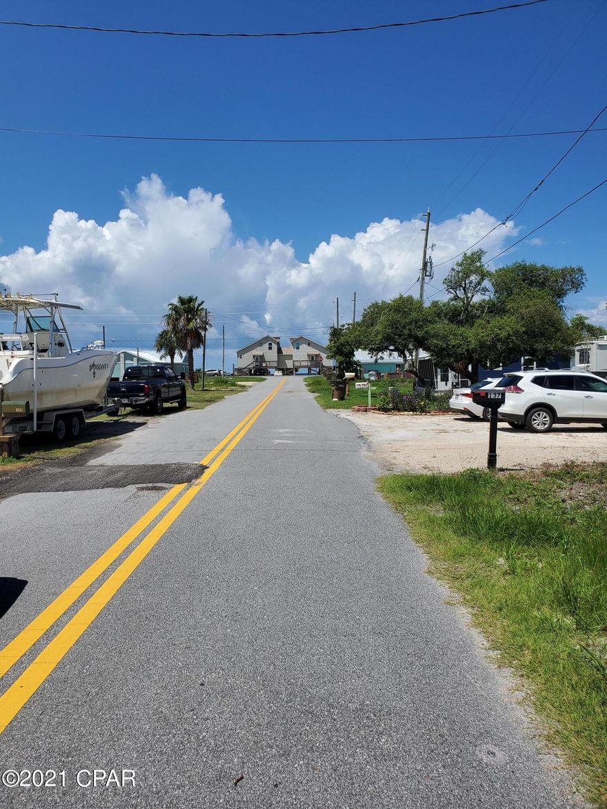 This is a vacant lot perfect for that custom dream home. Less then a block from the ocean. Provided you build on stilts you can possibly have an ocean view. As the Survey shows the back portion is zone X and X Shaded. This lot has dual entry one in front one in back. lot size is 50x150 

 

Water View From the Road