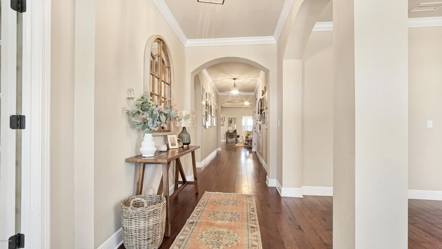 CURRENTLY UNDER CONTRACT, SELLER ACCEPTING BACKUP OFFERS This home sits on one of the most beautiful lakes in the area, with 100 feet of shore front property; this home has it all! From the moment you pull though the gates in this private community, you can feel the quality.  This home features an all brick exterior with hard wood floors,  high ceilings, elegant lighting and granite counter tops throughout. When you first enter this home you will notice a formal dining room with lots of natural lighting and a bonus room featuring a bay window and glass French doors that would make a great study or office.  This home feels open and welcoming as you proceed down the wide hall, you will find a large open Living Room where you will notice an elegant fireplace, high 12 foot step up ceilings, ... featuring large built in book cases and room for a very large TV. You will also notice the abundance of natural light throughout this space. For the chef in the family this kitchen is a dream! With countertops for days and a great lay out that can accommodate not only the chef but company with extra seating along the wrap around island. This kitchen has an abundance of cabinets and extra storage in the island along with a walk-in pantry. While in the open kitchen you will also notice the bonus space leading to the back porch overlooking the lake. This space is fantastic for additional seating, a play room or game room where you could add a pool table or even use it as a study. This room has a beamed ceiling and a wall of windows allowing for a lake view at all times. In the master bedroom you will find a large double vanity, elegant soaking tub, a large tile and glass shower and an enormous walk in closet. The master bedroom also overlooks the lake with stunning views. Throughout this house you will notice a total of 5 bedrooms 2 bonus rooms and 3 full bathrooms. This home also sits on over an acre of land with a long driveway and 2 car garage you will not be short on space or parking.