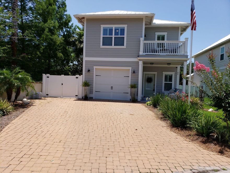 This 3 bedroom, 2.5 bath home offers an entertaining open concept & plenty of storage. Off the kitchen is a bar area with a wine cooler and cabinets, perfect for entertaining. New remote ceiling fans in all the rooms. Dual thermostat to control upstairs and downstairs temperatures. Kitchen features soft close drawers & cabinets, granite counter tops, gas stove with 5 burners, Whirlpool refrigerator and Frigidaire stove, microwave, and dishwasher. Washer and dryer are also included.  Laundry is on the 2nd floor. Master bedroom has his & hers closet & a balcony. Master bath includes garden tub with separate shower. Home has a covered front and back porch, backyard has pavers & Astroturf, front and side yard has new sod installed in 2019 and a heated & cooled one car garage to store your beach gear or golf cart. Irrigation system is on a well.

Home is less than a 1/4 of mile to the beach.

Optional - Some furniture can be purchased separately.

Amenities for residents to enjoy such as a community pool & a private dock to Lake Powell. There is a lavishly designed pavilion offering a amenity center, an entertainment gathering room with a fully-equipped kitchen. 

Grande Pointe at Inlet Beach is a beautiful community that's tucked away just North of Scenic Highway 30A. Camp Helen State Park, Inlet Beach and 30A corridor all within a 1/2 mile to the Gulf of Mexico. Whether you decide to use it as a secondary home or a rental investment, this home has endless potential!