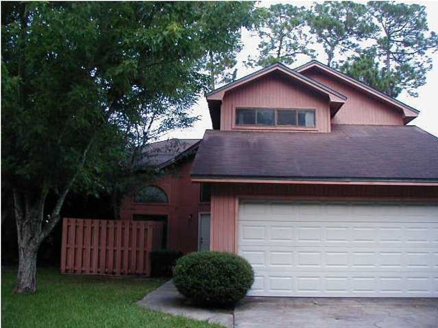 Comfortable rental home in great Lynn Haven area. Downstairs has kitchen with  a breakfast area opening to a private, fenced patio, unique living and dining areas with fireplace,  inside laundry room, and 1/2 bath.  Upstairs are three bedrooms and 2 full baths.  All rooms have ceiling fans. Small neighborhood with dead end street. Very convenient to 23rd St. and Lynn Haven shopping areas, restaurants and medical facilities. Many shade trees, privacy fenced backyard, 2 car garage with work bench. Easy access to both Tyndall AFB and Navy base. Will consider small dog but no cats.