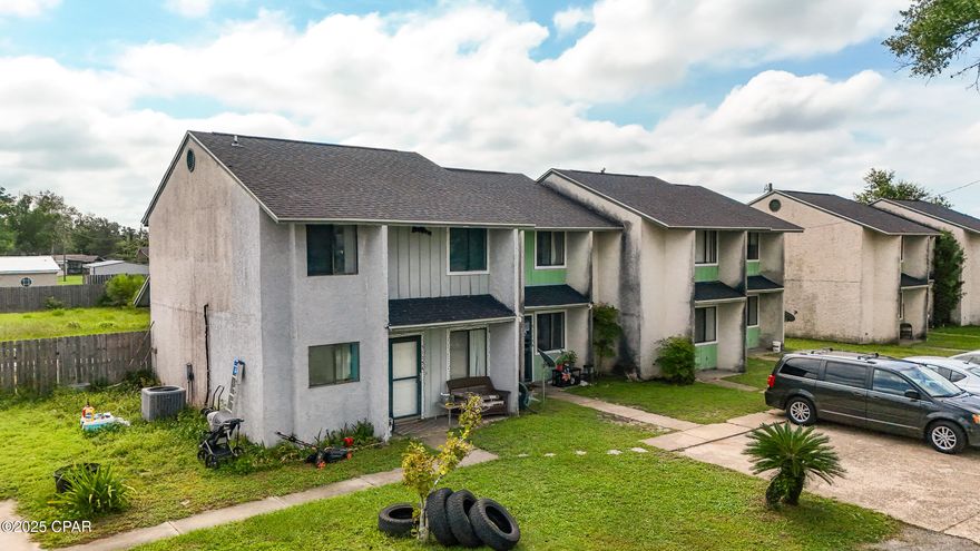 Investment Opportunity - 4-Unit Quadplex on 1.8 Acres with Expansion Potential

This rare multi-family property offers strong rental income and future growth opportunities. Sitting on 1.8 acres, it includes a four-unit townhome quadplex plus a rented mobile home, with plenty of space to add more units or amenities. Unit A is a spacious 3-bedroom, 2.5-bath home with approximately 1,400 square feet of heated and cooled space, a large fenced backyard, and a private pool. The remaining three units each feature 2 bedrooms, 1.5 baths, and approximately 903 square feet. All units are separately metered for water and electric, with tenants responsible for their own utilities. The mobile home on-site provides additional income, and the extra acreage offers excellent potential for future development, subject to local zoning. Conveniently located with easy access to Tyndall Air Force Base, shopping, and schools, this property is ideal for investors looking for immediate cash flow and long-term appreciation