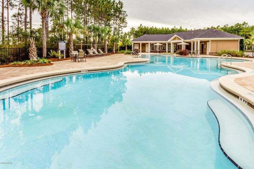 New Costruction! Enjoy 9' ceilings @ first floor.3 bedrm , 2.5 bths. Granite countertops in Kit and baths. Ivory profiled cabinets.Raised double sink vanity enhances master bath. Frigidaire stainless steel appls.  Only minutes to the turquoise water and sugary beaches of PCB! No worry lawn care! Breath taking design and warming beachy color selections