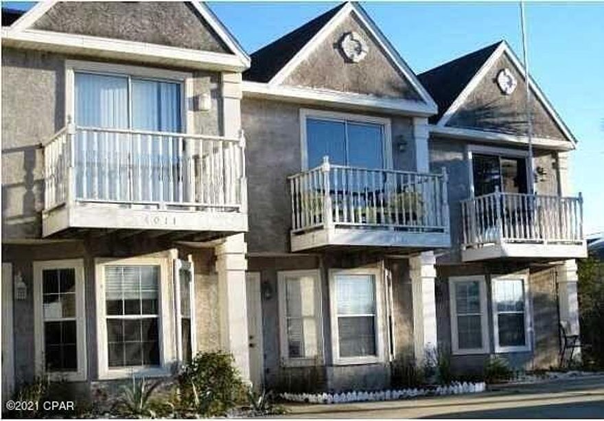 Great second home or investment property for short or long term rental. One of a handful available for under $300,000 Property is within 800 ft. to  beach access.

Home features a spacious living room that is open to the kitchen with a breakfast bar, a half bath on the main level and a laundry closet. The back door leads to a covered patio and a fenced yard with an owners closet. The second floor features two bedrooms and each has a full bath. Second bedroom has balcony. This property is conveniently located to many amenities, including Treasure Island, Light House and Pirate Cove Marinas, Capt. Andersons, Schooners ,jet-ski & pontoon rentals, shopping and much more.  The short term rental projections are $30,000. for 9 months. 2 months out of the yr are use by owner and family.