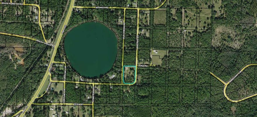 Ten lots for sale for a total of 2.4 acres +/-with a view of beautiful Round Lake and within walking distance to one of the swimming areas.  Located on a corner lot with frontage on Blackmon Road and Lakeside Drive. There is a well pump on the property but Buyer will need to verify if it's in working condition.  Plenty of room here for your home, a garden, and a pool.  Only five minutes to Alford shopping and Interstate 10 and only 50 minutes to Panama City Beaches and International Airport.  Many possibilities for this property.