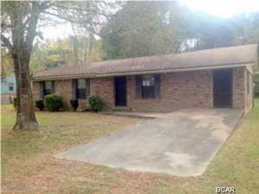 This recently updated home is on a large half acre lot features a split bedroom plan with one of the rooms offering a completely independent entrance. The master bedroom is handicap accessible to include larger doors and bathroom accommodations. The other bedrooms are good size offering walk in closet and ceiling fans. Recent updates feature new Stainless Steel Whirlpool Range & Range Hood, new Exterior door, new closet doors, new living room and bedroom ceiling fans, new carpet and fresh coat of paint throughout the entire home. Very comfortable brick home in a country setting but very near by one of the most quaint small towns in the area. Famous for the Tupelo honey. Square Footage, and room sizes approx, if important please verify.