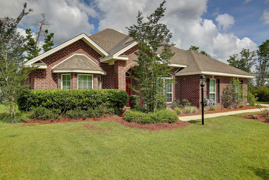 **SELLERS OFFERING $5k in CLOSING COST  with an acceptable offer.** Spectacular 4 bedroom 3 FULL baths, all brick home located in the Lake Merial subdivision, one of the most sought after neighborhoods in the area. Home has quality features and accents such as formal dining room, 4th bedroom/home office, layers of crown molding, trey ceilings in the dining room, family room and master suite, hardwood flooring and ceramic tile flooring, 10 and 12 ft. ceilings throughout, amazing arched door ways and so much more you. The gourmet kitchen boats granite countertops, an island, stainless appliances, pantry, cabinet lighting, plenty of cabinet and counter space, and opens to the cozy breakfast nook. You will find the spacious master suite is truly a retreat, with large walk in closets, master shower which is beautifully tiled, double vanities and a soaker tub. Bedrooms are all very spacious and have large closets and the additional baths are beautifully appointed. The back yard has an open patio making it the perfect place for those family cookouts, to maintain the lawn there is a sprinkler system with a separate lawn water meter.  In addition the exterior has a side entry garage, extra long driveway perfect for guest parking.  House is under a Termite Bond.  Home was build by D. R. Horton. Information was obtained from property appraiser and owner, including sq. ft. Call today for your private showing!!