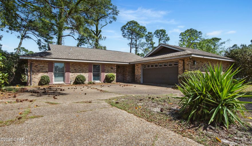 Investor Special in Bay Point! This is truly the lowest priced single-family home currently available in the prestigious, gated community of Bay Point—offering incredible value and potential. With 3 bedrooms, 2.5 bathrooms, and a spacious 2-car garage, this home is ideal for an investor or buyer looking to renovate and customize a home in a well-established, highly desirable neighborhood. The open-concept living and dining area flows seamlessly into a large kitchen, providing a perfect foundation for modern updates and entertaining.

This home features a functional layout with generous room sizes, plenty of natural light, and great bones—just waiting for the right buyer to bring it back to life. Whether you're looking to flip, rent, or create your dream home, this property offers outstanding potential and long-term value.

Bay Point is a gated, golf cart-friendly community with 24-hour security, a golf course, a full-service marina, tennis and easy access to local dining, shopping, and the white sandy beaches of Panama City Beach. Don't miss this rare opportunity to own in one of the beach's most sought-after communities at an unbeatable price! (this home has been virtually staged)