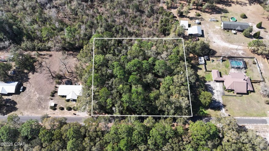 This 0.89-acre parcel down a quiet, paved street in Ponce de Leon, Florida, presents an exciting opportunity to create your ideal home in the peaceful, rural heart of the Florida Panhandle.
Sitting on nearly double the size of a standard half-acre lot, this property gives you even more space to design and build exactly what you envision--whether that's a spacious family home, a custom retreat with room for gardens, workshops, or outdoor living areas. The existing fallen-down house is ready to be hauled off, clearing the way for a fresh start and allowing you to shape the land to your liking without major obstacles.
Tucked in a serene, small-town atmosphere surrounded by forests, farmland, and natural beauty, it delivers true tranquility and privacy--perfect for escaping the everyday rush while remaining easily accessible.
Just about 45 minutes from the breathtaking white-sand shores of Panama City Beach--renowned for some of the world's most beautiful beaches--you'll have effortless access to weekend escapes filled with sun, emerald waters, and Gulf Coast vibes.
The surrounding area is packed with natural gems, including the nearby Ponce de Leon Springs State Park, featuring crystal-clear, year-round 68-degree springs ideal for swimming, plus relaxing nature trails and outdoor adventures.
Best of all, the seller is open to owner financing, offering flexible terms to help make this larger, promising lot your own piece of Florida paradise. Whether you're dreaming of a bigger homestead, a private getaway, or a savvy investment in this charming, low-key region, this property stands out with its extra acreage and clean-slate potential!