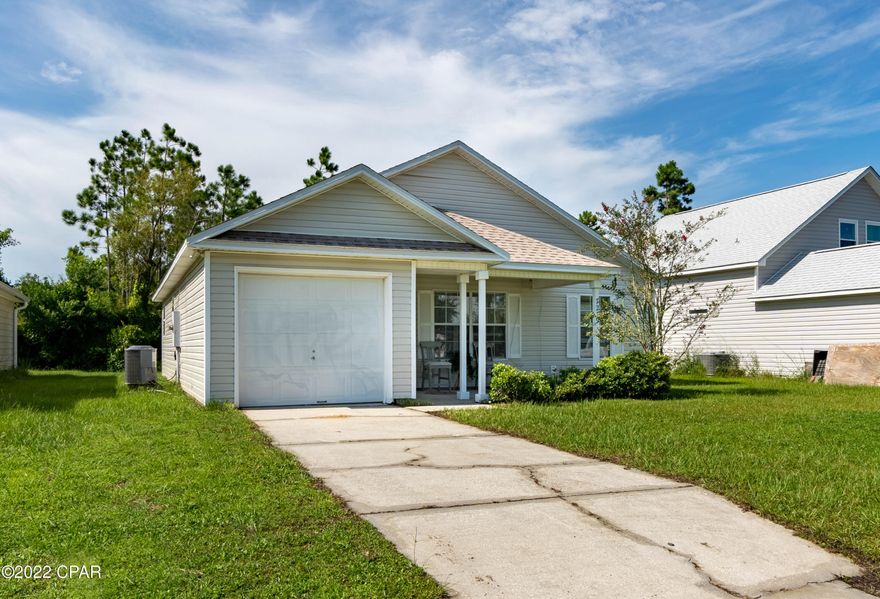 CURRENTLY UNDER CONTRACT, SELLER WILL CONSIDER BACKUP OFFERS' SWEETWATER VILLAGE! This home is in a great neighborhood and has 3 bedrooms, 

2 bathrooms with vaulted ceilings in the living room area. This home features a new roof, new siding, new hot water heater, a new microwave  and a single car garage! The home backs up to woods so you can enjoy the privacy of your back yard! As always, dimensions are approximate. Buyer to verify if deemed important.