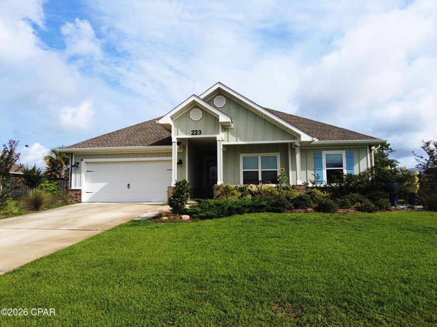 Waterfront Paradise on Newman Bayou with Gulf Access!

Welcome to your dream coastal retreat at 223 Confidence Way in the heart of Southport. This stunning 3-bedroom, 2-bathroom residence perfectly balances elegant interior design with an unmatched outdoor oasis.

Step inside to discover a bright, open floor plan highlighted by premium flooring, a large chef's kitchen featuring an expansive granite island with breakfast bar seating, stainless steel appliances, and gorgeous white cabinetry. The main living spaces and the luxurious primary suite are elevated by striking, double-tray scalloped ceilings that add architectural drama and depth. The master suite serves as a private sanctuary, complete with an expansive master bath boasting a double vanity with granite countertops, a deep soaking tub, and a separate walk-in shower.

The true showstopper of this property is the backyard. Walk out onto an expansive, custom-paved back patio covered by a dramatic wooden pergola, fully equipped with a high-end built-in outdoor kitchen and stone-wrapped grill station--ideal for hosting family cookouts or evening cocktail hours. Beyond the patio, a private wooden dock extends into the serene waters of Newman Bayou. Bring your boat, jet skis, or kayaks and enjoy direct, seamless access to the open waters of the Gulf of Mexico.

This property is exceptionally maintained and proudly offered as an Agent/Owner listing. Don't miss your chance to live the ultimate Florida waterfront lifestyle!