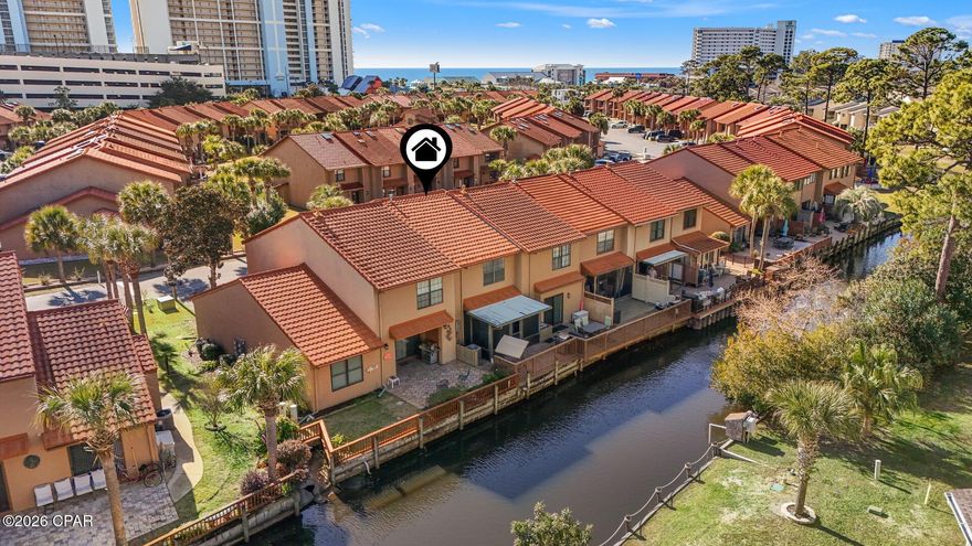 If ''home away from home'' is what you're after, this waterfront beach retreat is it! Search on YouTube ''For Sale 172 Grande Island in Gulf Highlands Beach Resort'' for video tour.
Welcome to this beautifully maintained island townhome, perfectly positioned just a 4-minute walk to the beach and directly across from the community's largest pool. Used exclusively as a second home, this residence is in exceptional condition and truly move-in ready. Enjoy peace of mind with a brand-new metal roof installed in 2024. The fully updated kitchen features granite countertops, solid wood cabinetry, and an open layout ideal for coastal living. Step out to the extended screened-in back porch, where stunning canal views set the stage for relaxing evenings and grilling fresh Florida seafood.
Island units are the largest and newest townhomes in the community, offering approximately 1,500 sq ft of open-concept living space, plenty of room to create your dream beach home. This property comes fully furnished and rental-ready, making it perfect as a primary residence, vacation getaway, or investment opportunity. Additional highlights include two assigned parking spaces directly in front of the unit, and VA & FHA approval.
Don't miss this rare opportunity to own a waterfront townhome so close to the sand, schedule your showing today! LOW HOA fees include: 11 pools(5 heated), pickleball, shuffleboards, water-front restaurant & pool, mini golf, exercise room, tennis courts, playground, WIFI, pest control, termite bond, trash, ground keeping, property patrol, gated community and more.