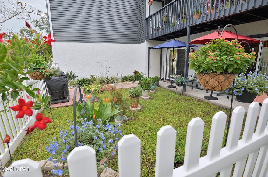 You'll not want to miss this beauty on the east end of the beach.  This first floor condo has new Waterproof Vinyl plank flooring, updated bathrooms, fresh paint, and so much more.  The fenced courtyard is a gardeners delight.  The home offers split bedrooms with access to the courtyard.  Come check out this spotless beauty today.