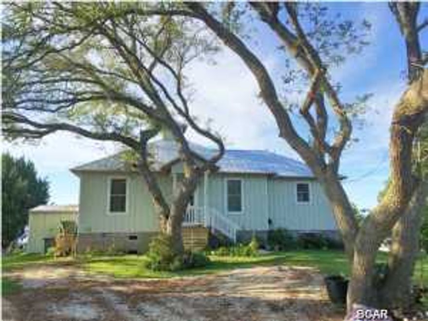 Newer constructed home directly on the mouth of Laird Bayou offering easy access to East Bay, the Gulf of Mexico, and the Inter-coastal Waterway. Home offers custom wood tile flooring, wood mouldings, upgraded kitchen with custom wood cabinetry, stainless appliances, and Patagonia Redwood counters trimmed in Travertine, master suite with great view of the water, tile shower, soaking tub and upgraded vanity. Exterior offers deep water close to shore, covered porch, and storage building. Click photo for additional pics, virtual tour, and homes website.