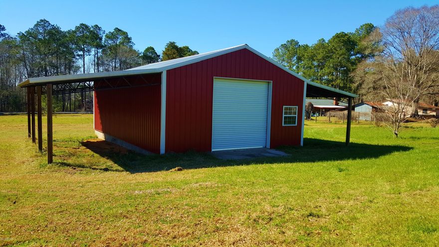 Rareness in Red! This red beauty and 1.5 acres, in the highly sought after Nearing Hills community of Chipley, is a true rare find! The land has produced some of the best tomatoes and vegetables ever eaten! It offers planted centipede grass on the front 2/3, rye in the back, and crepe myrtles aligning the front of the property. You will be a step ahead of your plan with a 48x36 (1728 sq ft under roof) building that features an enclosed 864 sq ft garage/workshop, 10x10 roll up door, poured concrete flooring, a stairway leading to the 24x8ft loft, and (2) 12x36 lean-to's. This is not your standard pole barn! The engineered drawings were signed and sealed to meet all hurricane wind speed ratings and built in 2013 to all county building codes. Bonus features: Galvalume metal roof, pressure treated posts, side entry door, and the building is fully electric and wired for 110 and 220 outlets. Property is right outside of the city limits, conveniently located close to schools, shopping, restaurants, and the hospital. Within 45 miles to the international airport and the sandy white beaches of Panama City Beach. Florida's tallest waterfall at Falling Waters State Park is only 4 miles away!