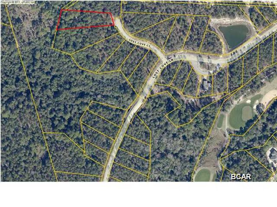 Come see this large wooded private residential lot in the quiet gate community of Wild Heron. The Wild Heron community has lush botanical landscaping, fitness center, pool & hot tub, boathouse with canoes/kayaks, boardwalk along Lake Powell, sidewalks & nature trails, and and places to view spectacular sunsets. Wild Heron POA dues are $285/quarter, Wild Heron CDD fees are $2,521/year. Located 2 miles from Rosemary Beach and 30A area and approximately 7 miles to all the shopping, restaurants, and fun at Pier Park. Incredible location in quiet neighborhood but close to all the action.
