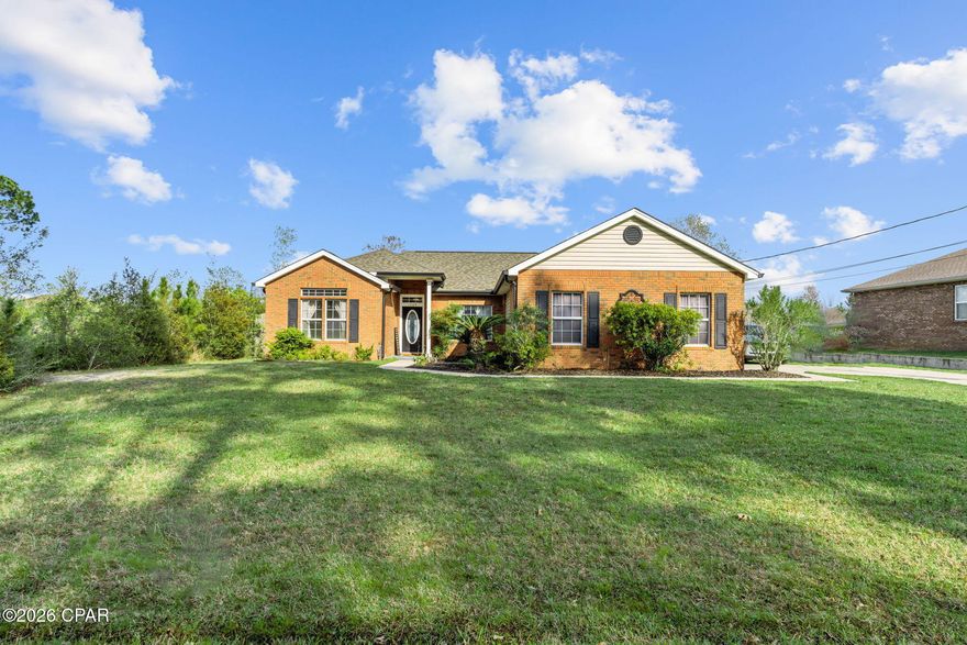 Welcome to this well-maintained 3-bedroom, 2-bath home offering 1,963 square feet of comfortable living in the heart of Lynn Haven. Tucked away on a quiet dead-end street, this property provides a rare combination of privacy and convenience--with protected wetlands across the street ensuring a peaceful, natural backdrop that won't be built on.

Inside, you'll find a desirable split-bedroom floor plan, with the spacious primary suite situated on its own side of the home for added privacy. The living room features vaulted ceilings and a cozy fireplace, creating an open yet inviting space for gathering and relaxing. The home also offers both an eat-in kitchen and a separate dining area--perfect for everyday living and entertaining alike. A heated and cooled Florida room adds even more versatile living space, ideal for a home office, playroom, or relaxing retreat year-round.

Step outside and enjoy a backyard designed for both relaxation and entertaining. In addition to the above-ground pool with an expansive custom deck, you'll find a dedicated firepit area--perfect for gathering with family and friends on cooler evenings. The privacy-fenced backyard also features a large gate, providing easy access from the long driveway for boat or RV storage. A 2-car garage and extended driveway offer ample parking for guests and all your recreational needs.

Located in a desirable Lynn Haven area and zoned for Lynn Haven Elementary, Mowat Middle, and Mosley High School, this home also sits within a golf cart-friendly community, making it easy to enjoy nearby parks, schools, and local amenities.

If you're looking for space, functionality, and a private setting in a great location, this home checks all the boxes.