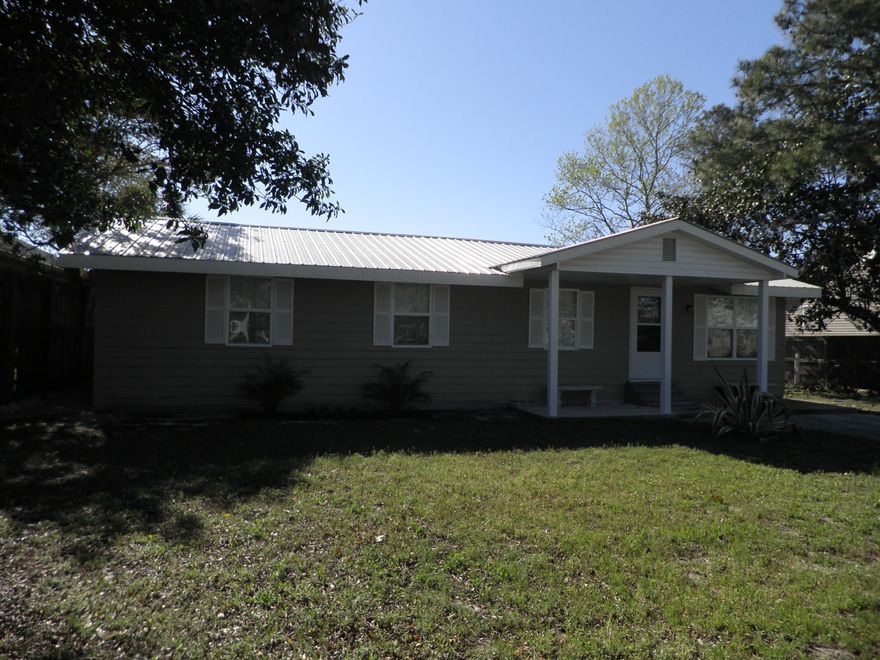Check out this updated Beach home in desirable Gulf Highlands neighborhood! The large living space as you enter the home is inviting & relaxing with lots of windows. Metal roof in 2012,  Bathrooms and kitchen have been updated. Stainless steel appliances and new cabinets in kitchen and baths. Large fenced back yard with a porch swing to watch the sunsets. Plus, an outdoor shower at the back porch helps wash off the sand after a day at the beach. This home is move-in ready and would be a great first-time buyer home. You are less than 1.5 miles to Pier Park with numerous areas to dine, shopping, and entertainment. Only a mile away from Frank Brown Park. About 1/2 mile from the sandy beaches of the of Mexico. Measurements should be measureed if important to buyer.
