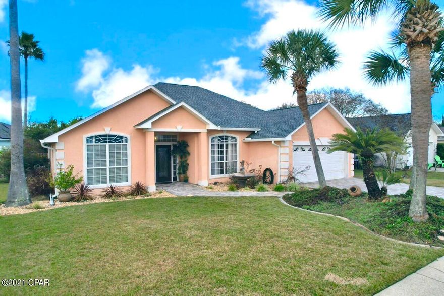 Welcome to your new Beach Home! Bring your flip flops and swimwear. Enjoy soaking up the sun in your private back yard pool or take a short walk to the Sandy Beach and enjoy the Sunset. This beautiful 3bd 2ba updated home also offers a separate office, new kitchen complete with leathered granite counter top and gas double oven range, amazing tiled gas fireplace, formal dining room, tile floors throughout, completely resurfaced heated pool with new outdoor deck with kitchen and dining area, too many upgrades to list! Call for your private viewing today