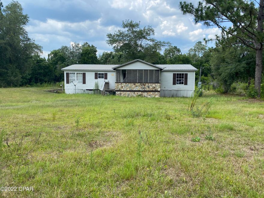 FIXER UPPER ON 1.2 ACRES LOCATED IN A NICE NEIGHBORHOOD. IF YOU ARE LOOKING FOR COUNTRY LIVING NOT FAR FROM TOWN THIS WOULD MAKE A GREAT HOME FOR YOU. ONLY ABOUT 25 MINUTES TO LYNN HAVEN AND 35 MINUTES TO PANAMA CITY BEACH. THIS WOULD BE A GREAT INVESTMENT, RENTAL OR SECOND HOME AS WELL. THIS IS A GREAT PRICE POINT AND IT WILL NOT LAST LONG. PLEASE VERIFY ALL IMPORTANT INFORMATION. ALL SIZES AND INFO/ APPROXIMATE.