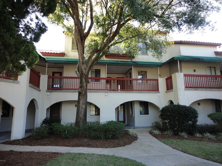 Much desired gated community, If you enjoy boating and a place to park your boat, fishing, kayaking, anything on the water come and see this updated lovely 2 bedroom, 2 full bath/1 half unit.  Kitchen has been updated, family room is nice size great for entertaining, vaulted master bedroom suite has a large bright sitting room, master bath and two large closets.  Location is the best...on lagoon and a short walk to the GULF.  MUST SEE!!  Landscaping being re-done in front of building, some awnings being replaced and building will be power washed all in the very near future. Seller says continue to show.