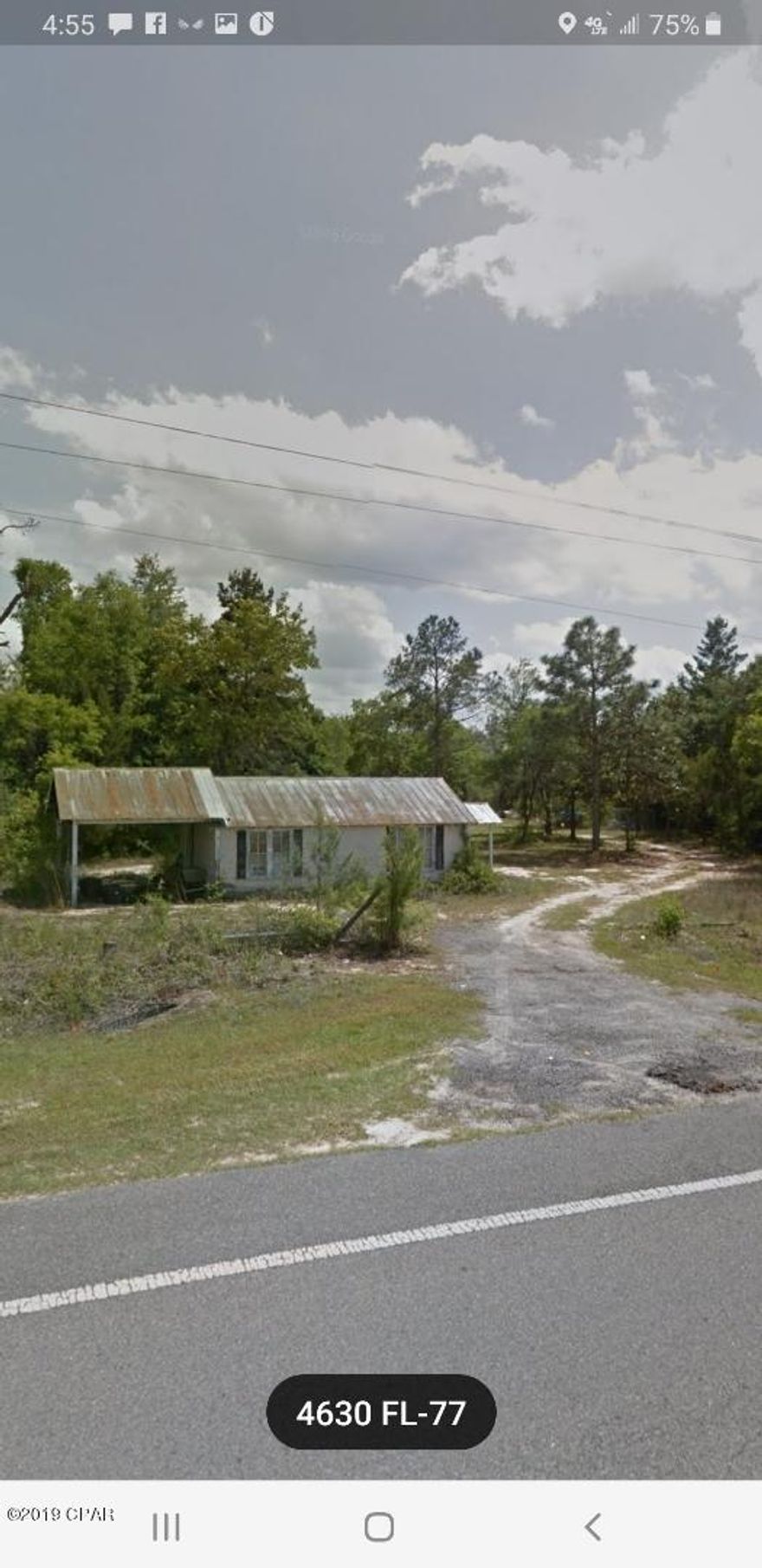 BEAUTIFUL 9 ACRE TRACT WITH GREAT FRONTAGE ON HWY 77 AND CONTINUES DOWN BOISE CIR.  THERE ARE STRUCTURES ON THE PROPERTY BUT ARE NOT GIVEN VALUE.  ONE BUILDING AT THE FRONT OF THE PROPERTY WAS A MECHANIC SHOP. THERE ARE TWO TRAILERS ON THE PROPERTY THAT NEED ATTENTION IF YOU WANT TO USE THEM. WALK BACK THROUGH THE PROPERTY AND FIND BEAUTIFUL HARDWOODS GENTLE SLOPPING LAND.