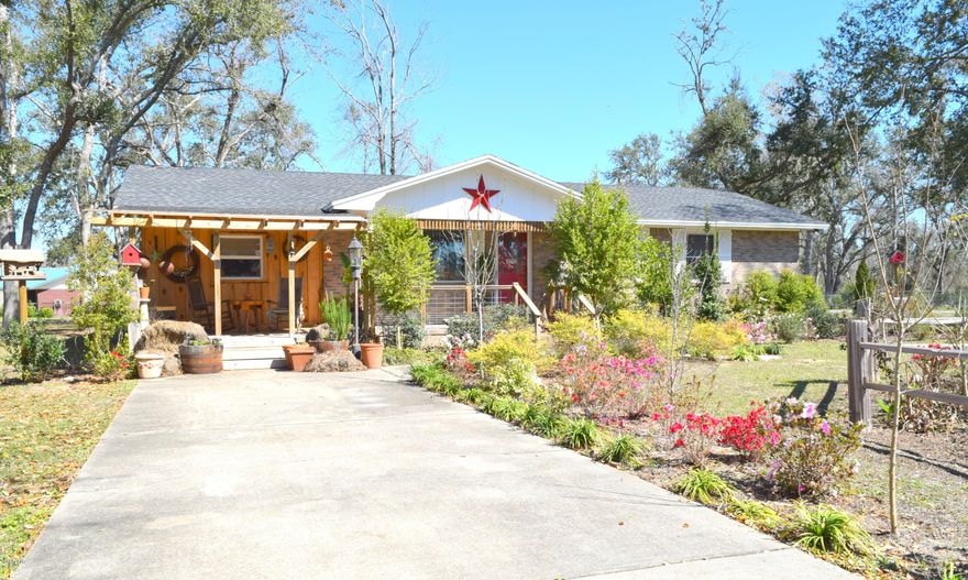 'CURRENTLY UNDER CONTRACT, SELLER ACCEPTING BACKUP OFFERS. This cozy cottage has undergone a major overhaul and is ready for its new owners.  Walk in the front and your immediately greeted with custom finishes such as cypress trim, shiplap, wood-look tile flooring, new kitchen cabinets with Quartz countertops and stainless-steel appliances. Other renovations include electrical and plumbing upgrades, energy efficient windows, new sheetrock, fresh paint and a new architectural shingle roof. Enjoy your time outside from either the front or back porches overlooking the well-manicured lawn. Home sits on a corner lot measuring approximately .92 acres.