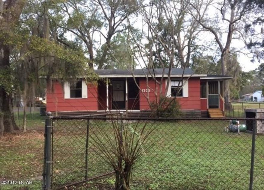 Cottage home with 2 Bedrooms and 1 Bath located on a corner lot in Southport, FL. Fenced yard. Being Sold ''AS IS''.