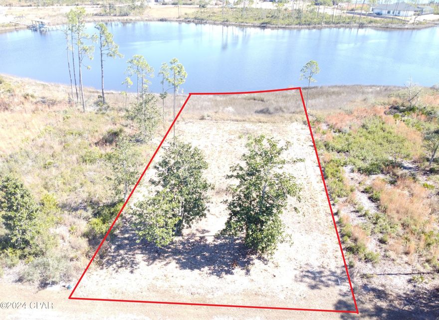 Spectacular Waterfront in the desirable Laird Point. Build your Dream Home on one of the best waterfronts in the area. Excellent year round water depths to accommodate your large cruiser or fishing vessel. No worries of low tides or low bridges preventing you from the Gulf of Mexico. Laird Point is located on East Bay which boasts some of the best redfish and speckled trout fishing in the panhandle. Laird Point is gated waterfront community with city utilities, underground electric, and ribbon curbed streets. Amenities include tennis courts and RV/Boat storage. Experience water views at nearly every turn in this community. Great proximity to Mexico Beach, Port St Joe and Panama City Beach. Close to shopping and restaurants. Call to schedule a tour of Laird Point.