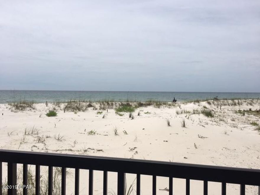 Look at that view from your living room and balcony!  Popular ground floor unit will give you lots of wonderful vacations and memories and provide rental income to offset the cost of owning your own Gulf front unit.  This 2 bedroom/2 bath unit is nicely furnished with higher-end furniture, has bedroom closets converted to more usuable space,  18'' tile throughout provides easy care, updated bathrooms,  and the white and bright kitchen is fully furnished.  Seller is in the process of replacing stove, refrigerator and washer/dryer in this unit so you will have new appliances in place.  Pinnacle Port Resort is situated on a 25+ acre site within a beautiful gated community having over ¼ mile of beach frontage! The complex has lots of amenities including two swimming pools, tennis courts sauna/steam room, fitness room, its own private freshwater dock with boat slips boat launch and wi-fi.   Please note that the Association fees include electricity for heating, cooling and hot water.  The owner pays a small electricity bill for lighting and appliances only.