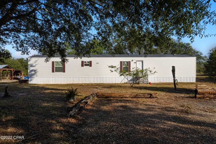 Over five acres nestled right between Crystal, Compass, and Open Lake.  This property is high and dry, and has been cleared.  Make yourself at home in the well kept, three bedroom home built in 2020.  This quiet property affords plenty of room for any livestock or crops, as well as future buildings.  Make it your own and enjoy the peaceful, country living.  All measurements are approximate and should be verified if important.