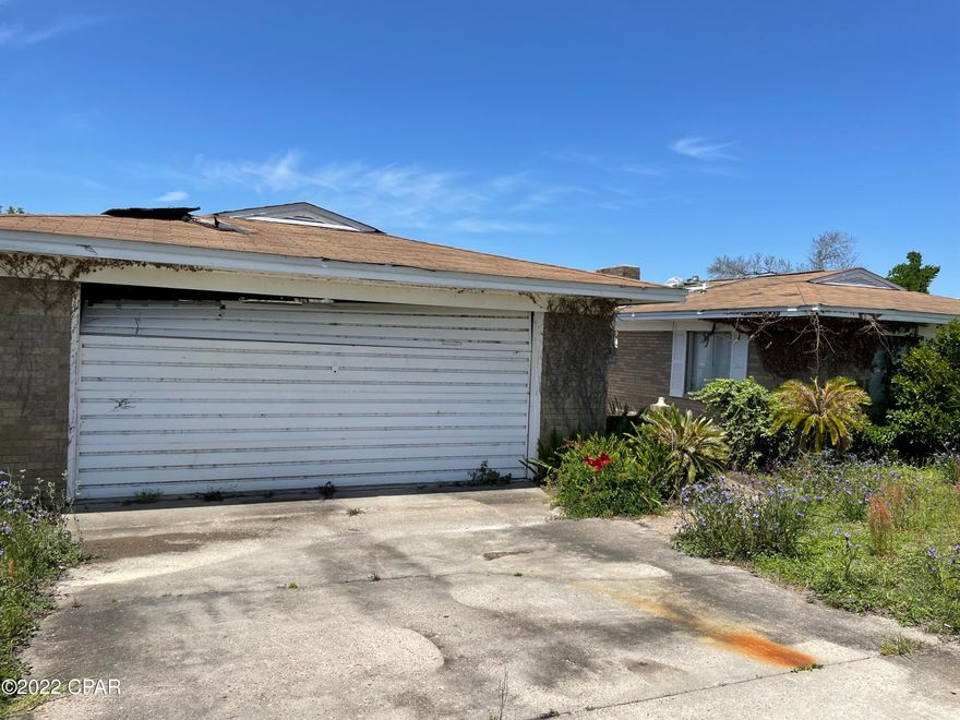 ATTENTION INVESTORS. WATERFRONT HOME OVERLOOKING INGROUND POOL,& LAKE. City will allow it to be rebuild. Seller has done house plans, engineer report, that is attached under documents section. ARV is $315k